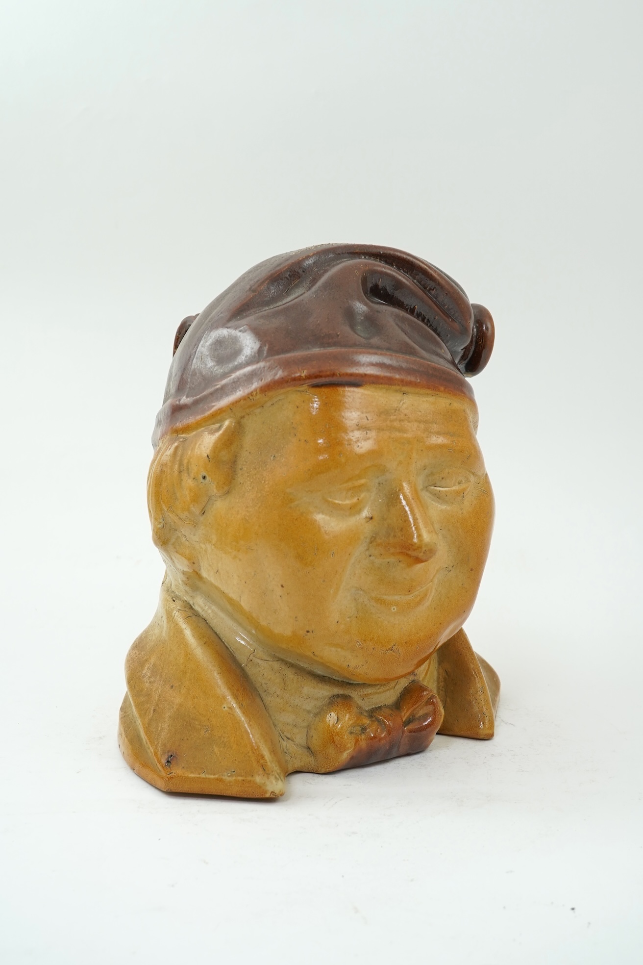 A large 19th century Johnny Souter, salt glazed stoneware spirit flask impressed T A Moss wine and spirit Merchant Bell Mount street Grosvenor square, 28cm high